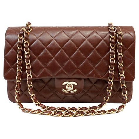 chanel brown and pink clutch|Chanel lambskin bag.